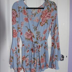 A floral long sleeve Billabong romper
